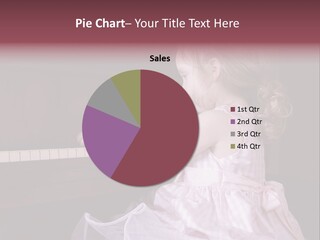 Three-Year Old Girl Sitting A A Piano. PowerPoint Template