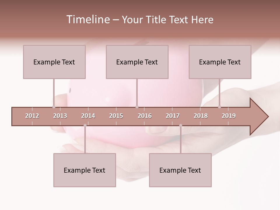 A Person Holding A Pink Piggy Bank In Their Hands PowerPoint Template