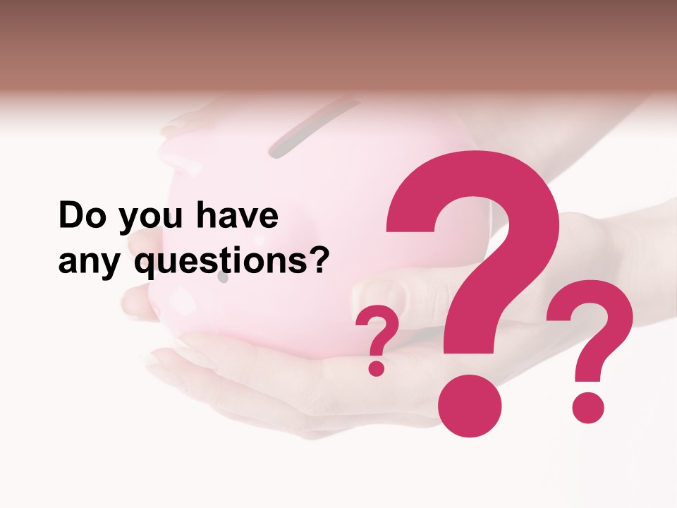 A Person Holding A Pink Piggy Bank In Their Hands PowerPoint Template