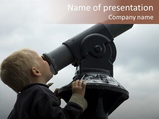 Boy Looking Into The Sky Through A Telescope. PowerPoint Template