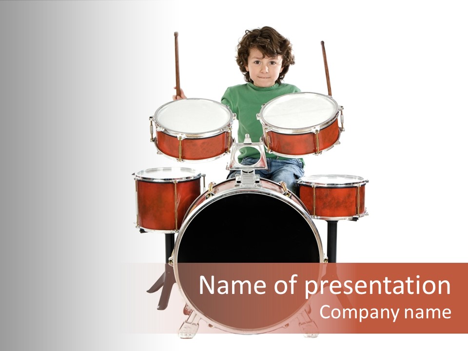 A Young Boy Sitting Behind A Drum Set PowerPoint Template