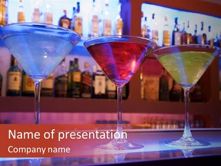 Blue, Red And Yellow Cocktail Drinks On A Bar PowerPoint Template