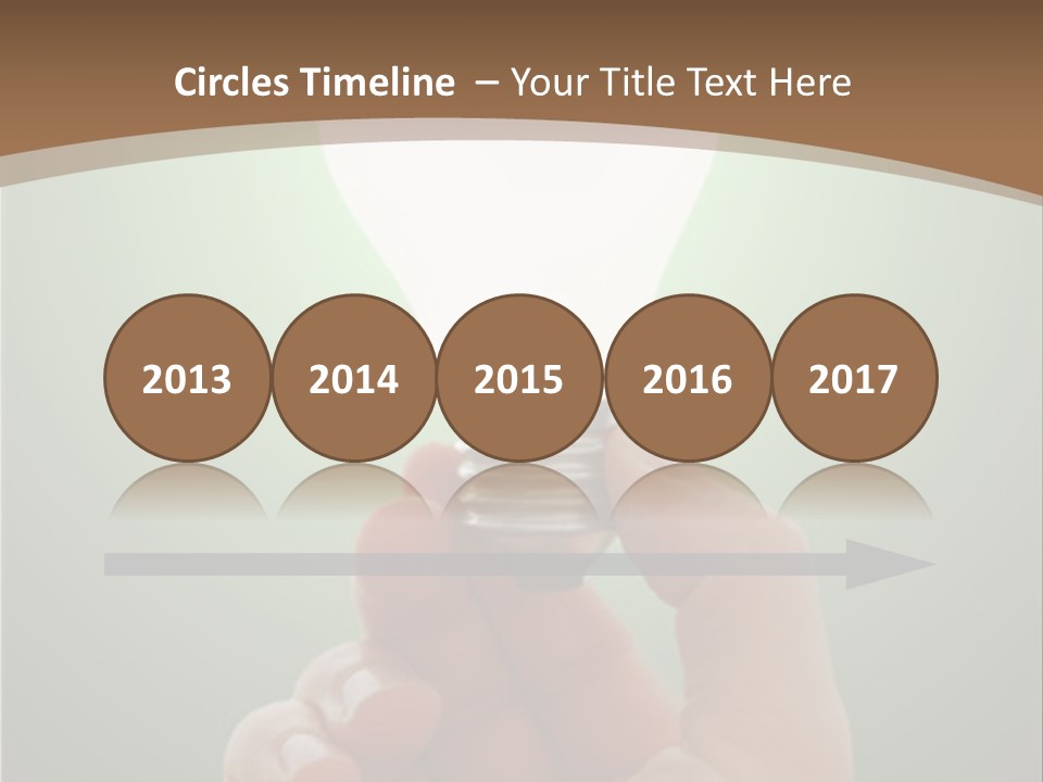 Glowing Lightbulb In Hand PowerPoint Template