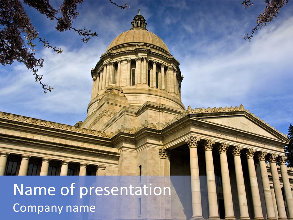 Neo Classical Style Legislative Building On A Late Afternoon In Early Spring PowerPoint Template