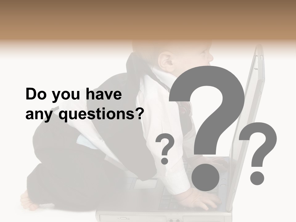 Adorable 10 Month Old Baby Boy In Suit, Barefoot, With Laptop Computer. Making Cute Grumpy Face At Computer Screen. Shot In Studio Over White. PowerPoint Template