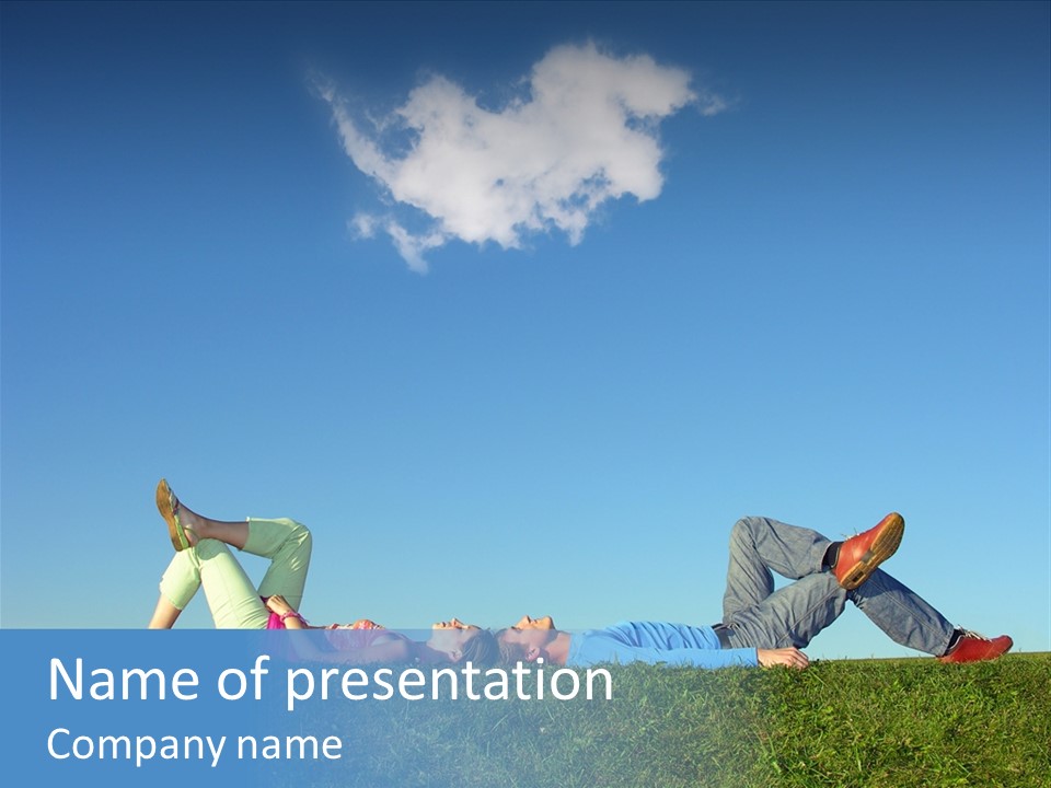 A Couple Of People Laying On Top Of A Lush Green Field PowerPoint Template