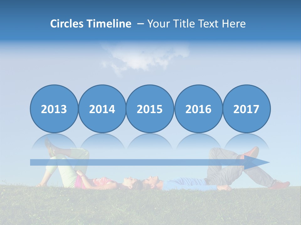 A Couple Of People Laying On Top Of A Lush Green Field PowerPoint Template