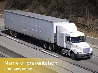 White Semi Truck On The Highway PowerPoint Template