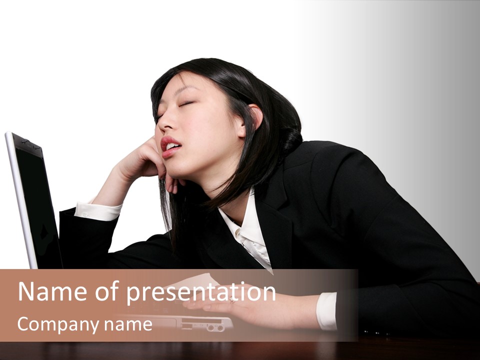 Young Businesswoman Asleep At Her Computer PowerPoint Template