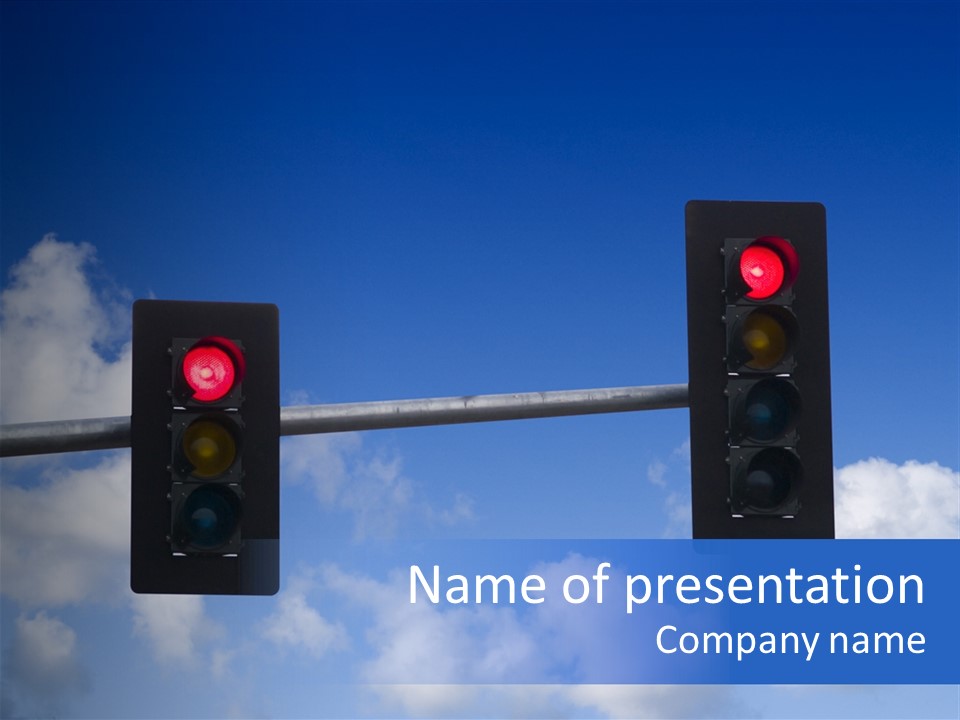 A Close Up On A Red Traffic Light With Blue Sky And Clouds In The Background. PowerPoint Template