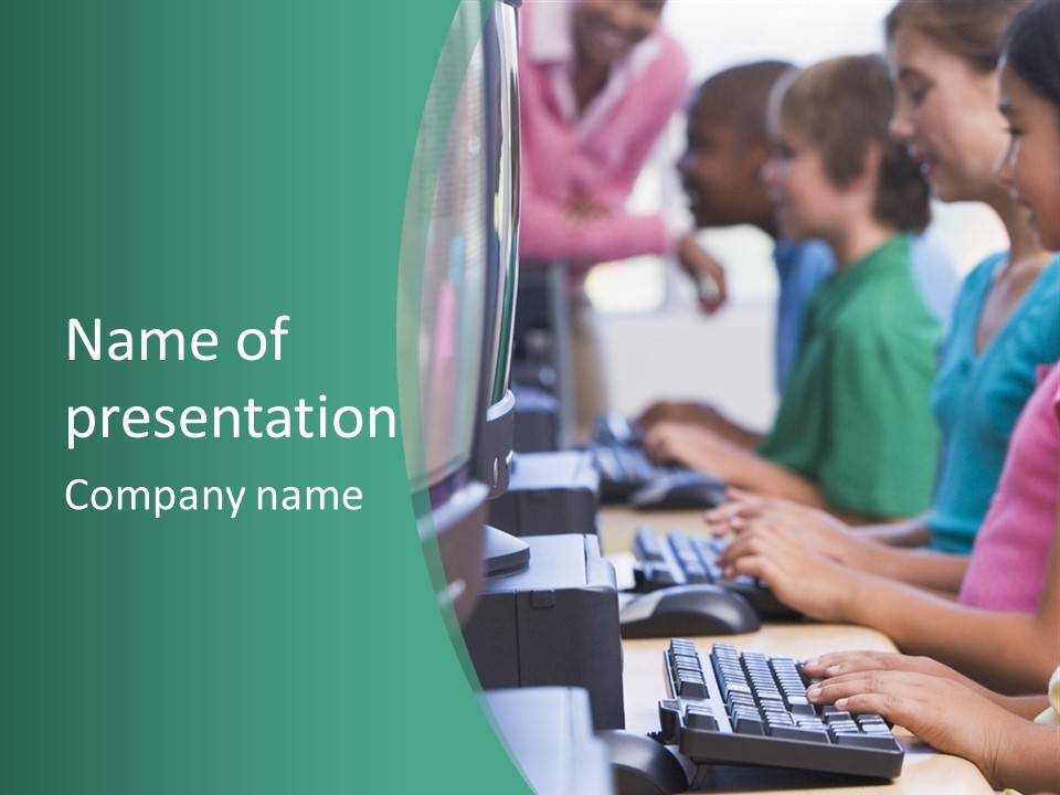 Male Pupil In Elementary School Computer Class PowerPoint Template