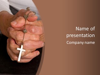 A Close Up View Of Praying Hands PowerPoint Template