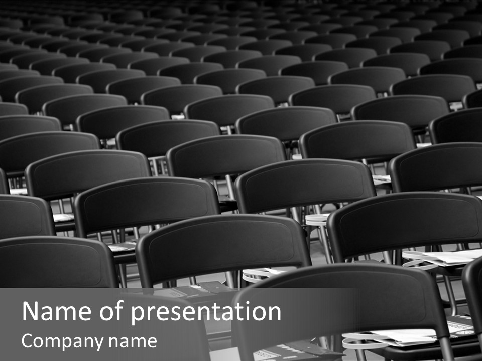 Chairs In A Conference PowerPoint Template