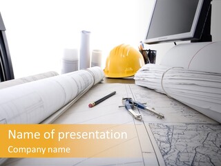 A Professional Desktop Of An Engineer With Drawings Computer. PowerPoint Template