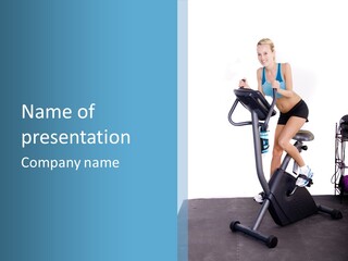 A Woman Is On A Stationary Exercise Bike PowerPoint Template