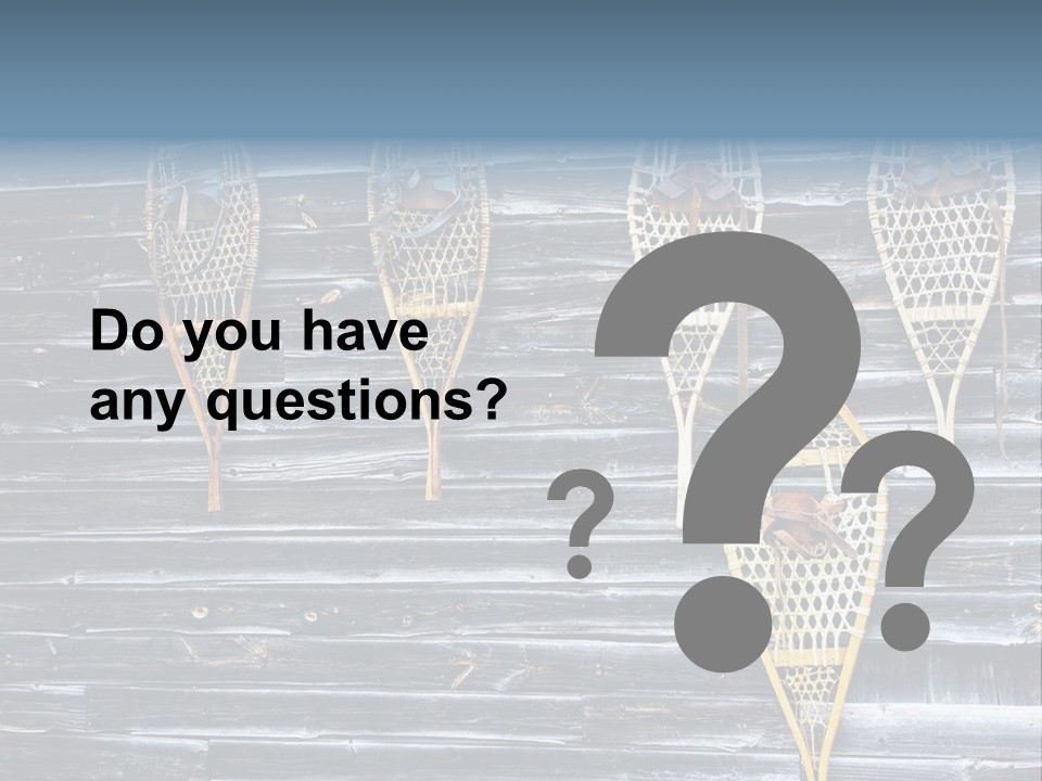 Old Snowshoes Nailed To The Side Of An Old Weathered Barn PowerPoint Template