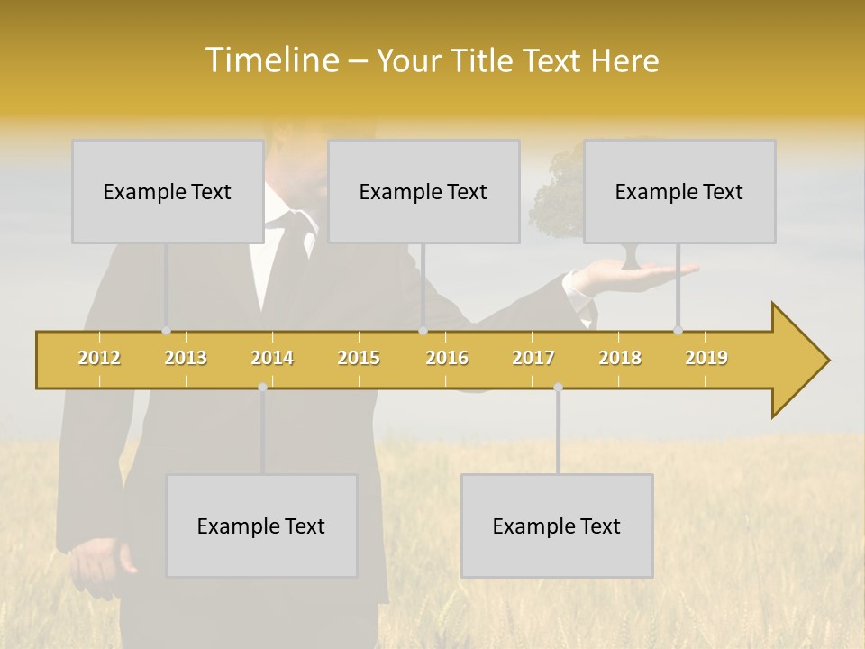 Businessman Holding A Tree In The Hand - Environment Concept - Focus On The Tree PowerPoint Template