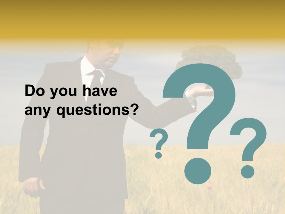 Businessman Holding A Tree In The Hand - Environment Concept - Focus On The Tree PowerPoint Template