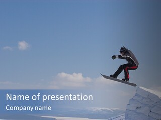 A Man On A Snowboard Jumping Over A Cliff PowerPoint Template