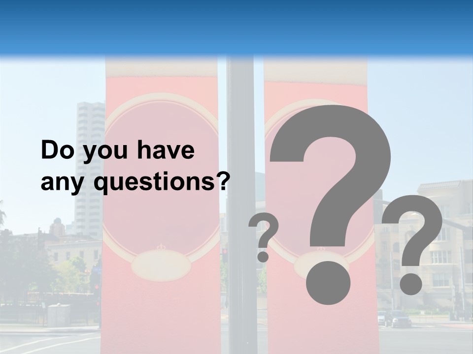 A Street Light On A City Street With Buildings In The Background PowerPoint Template