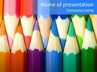 A Group Of Colored Pencils With A Blue Background PowerPoint Template