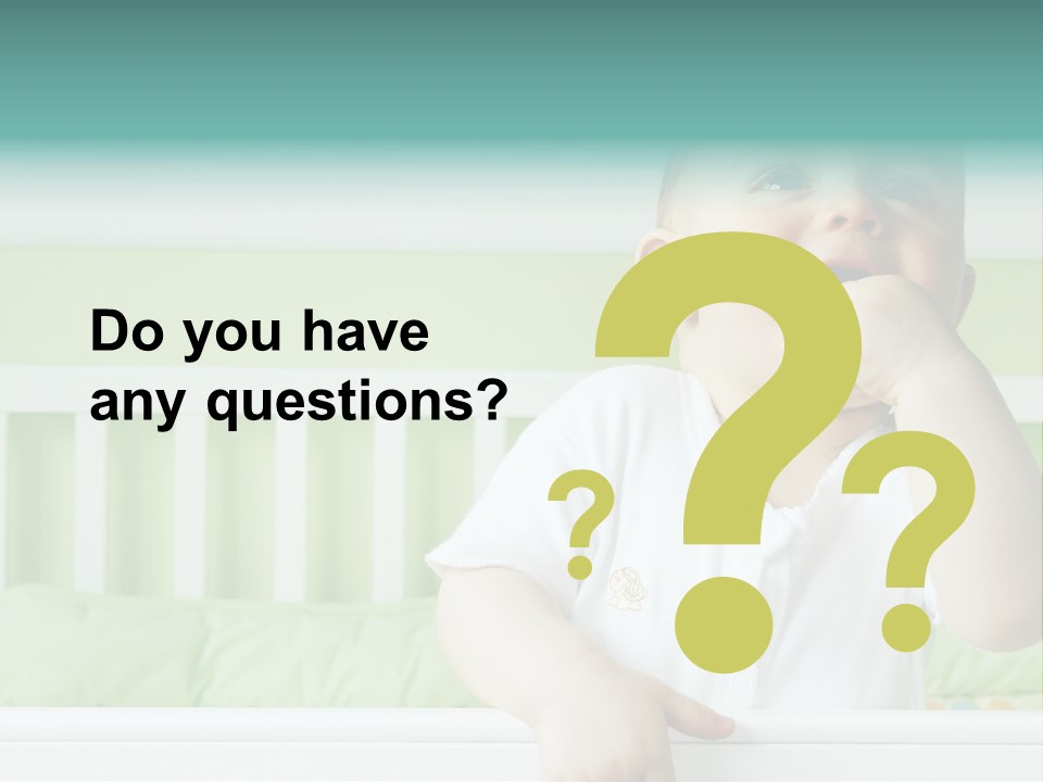 Baby Boy Smiling In Crib PowerPoint Template