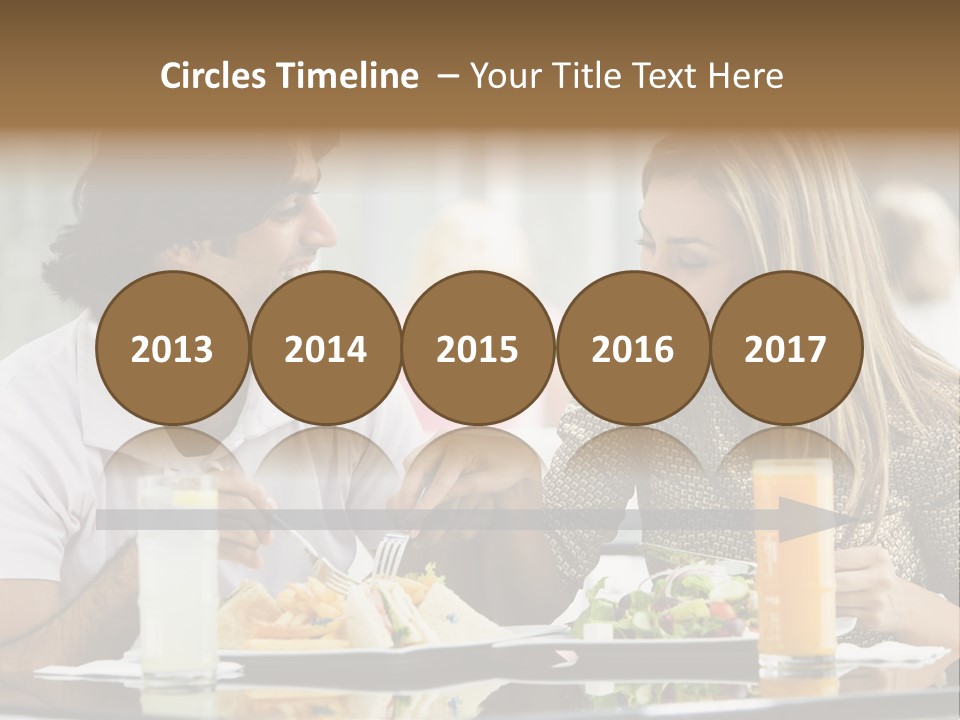 Couple Enjoying Lunch Sitting At Cafe Table PowerPoint Template