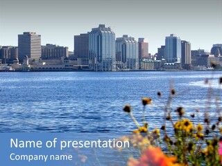 A Large Body Of Water With A City In The Background PowerPoint Template