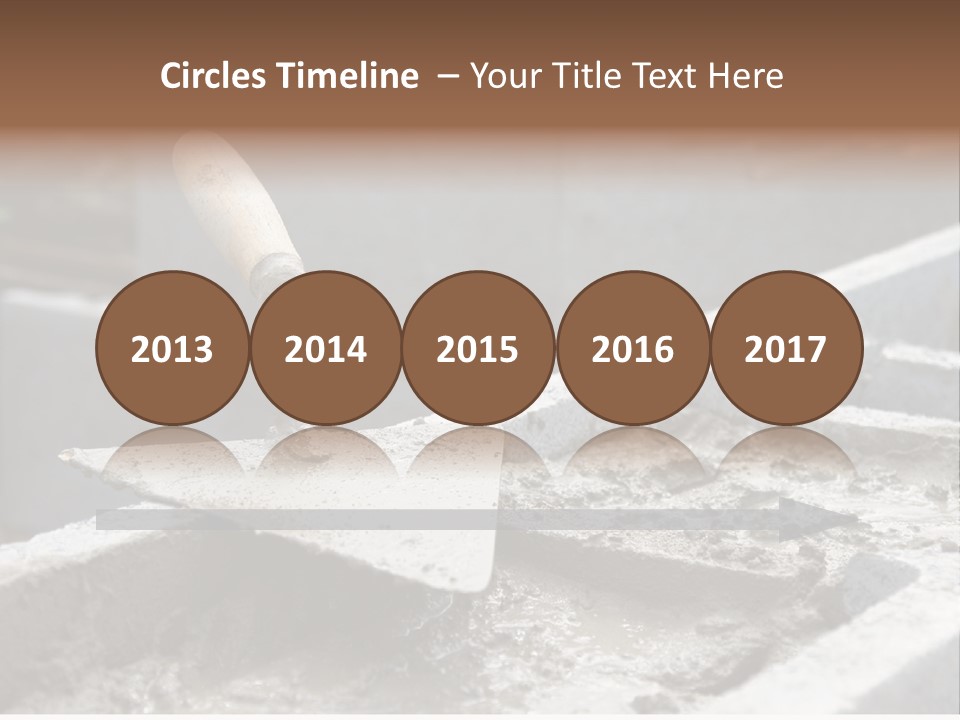 Closeup Of Mason's Trowel On Concrete Shuttering Blocks Filled With Mortar PowerPoint Template