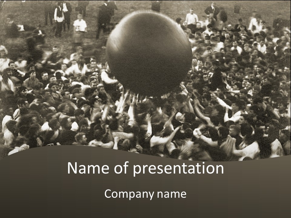 Vintage Photo Of A Crowd Tossing Large Ball Around PowerPoint Template