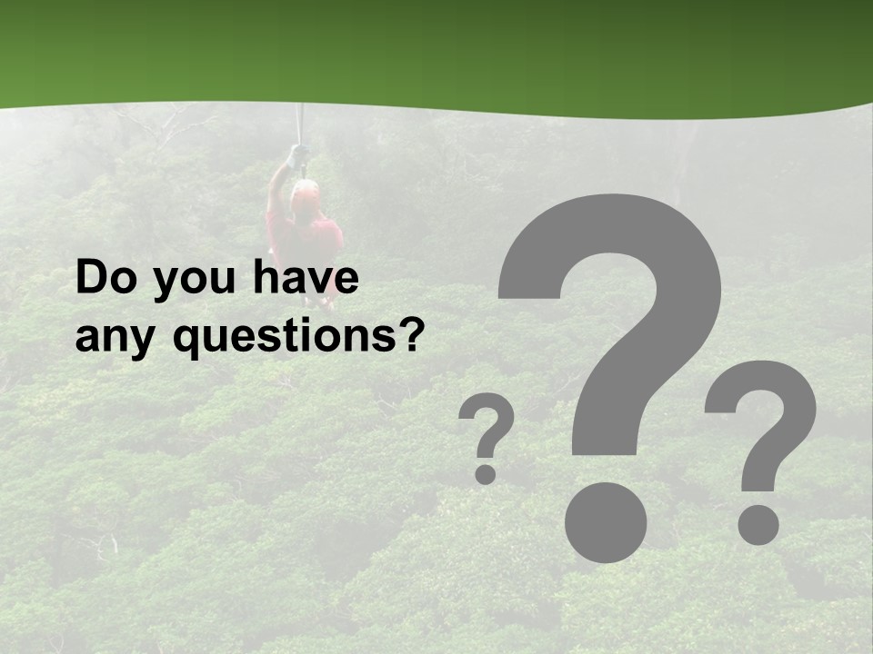 A Man Ziplines Through The Cloud Forest Of Monteverde, Costa Rica PowerPoint Template