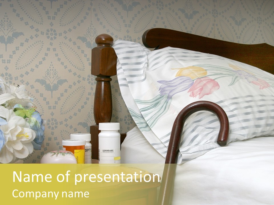 Medicine Bottles And A Cane Against A Bed For An Elderly Person PowerPoint Template