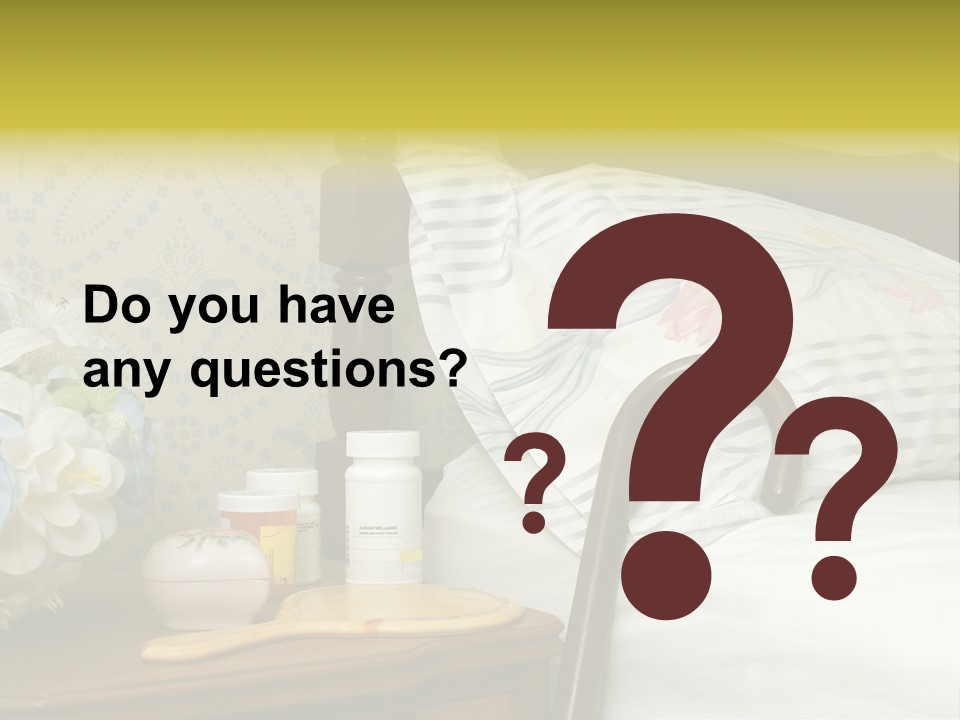 Medicine Bottles And A Cane Against A Bed For An Elderly Person PowerPoint Template