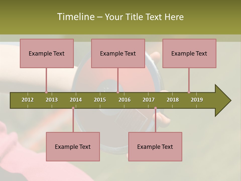 Discus In Hand With Athletic Field In Background PowerPoint Template