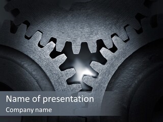 Close-Up Of A Set Of Metallic Gears. PowerPoint Template