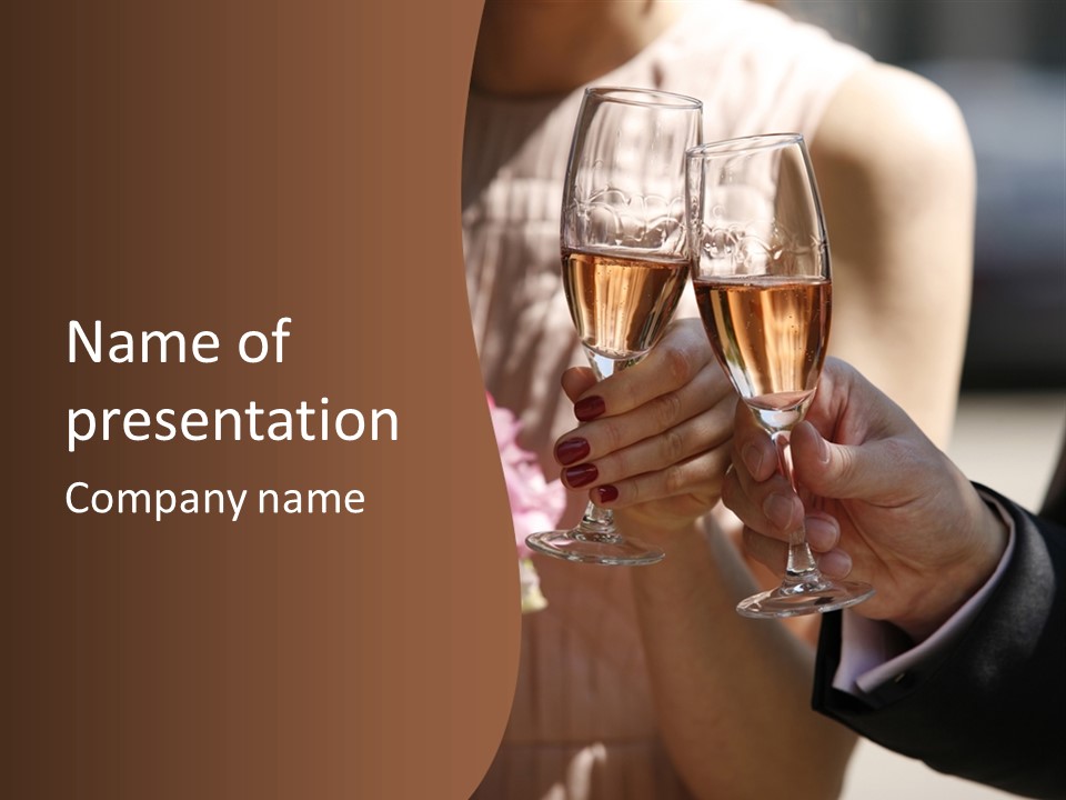 Glasses Of Champagne In A Hand Of The Groom And Bride PowerPoint Template