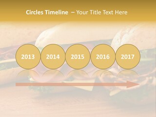 Three Fresh Sandwiches - Turkey Breast, Ham & Swiss And Salami On A Cutting Board. Focus On The Ham Sandwich PowerPoint Template