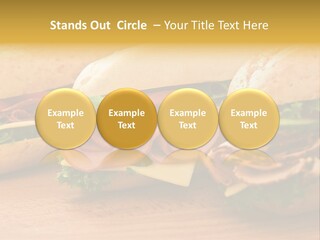 Three Fresh Sandwiches - Turkey Breast, Ham & Swiss And Salami On A Cutting Board. Focus On The Ham Sandwich PowerPoint Template