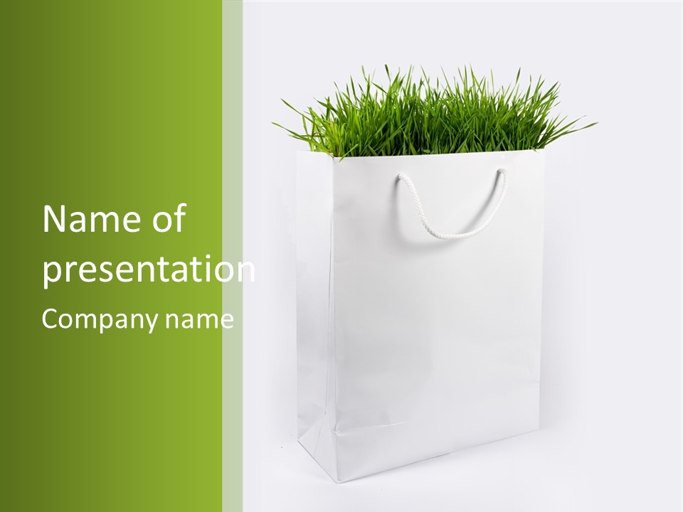 Environment Concept - Green Grass In White Paper Bag PowerPoint Template