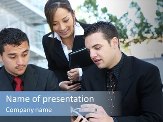 A Group Of Business People Looking At A Computer Screen PowerPoint Template