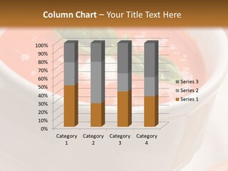 Closeup Of Bowls Of Delicious Tomato Soup Garnished With Cream And Basil Leaves PowerPoint Template