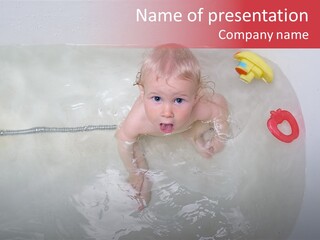 A Baby In A Bathtub With Toys In It PowerPoint Template