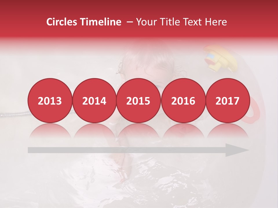 A Baby In A Bathtub With Toys In It PowerPoint Template