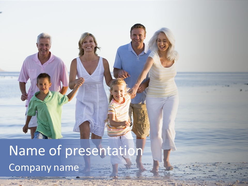 Extended Family Walking On Beach PowerPoint Template