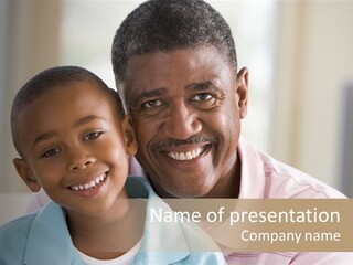 A Man And A Boy Are Smiling For The Camera PowerPoint Template