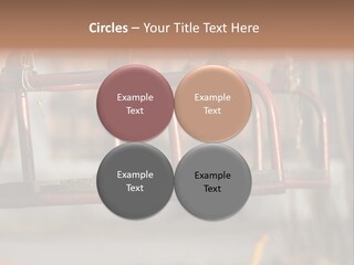Closeup Of Aged Swings On A Playground PowerPoint Template