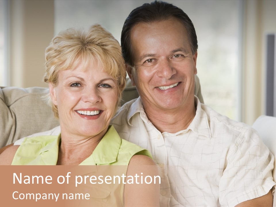 Couple Relaxing In Living Room And Smiling PowerPoint Template