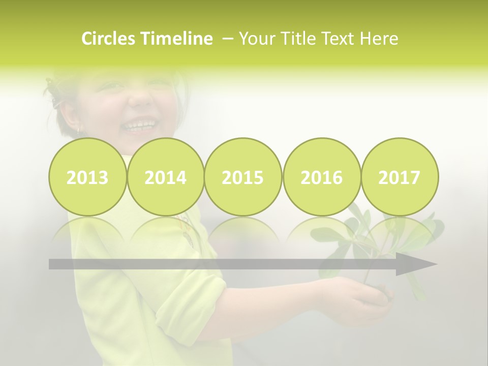 A Little Girl Holding A Plant With A Smile On Her Face PowerPoint Template