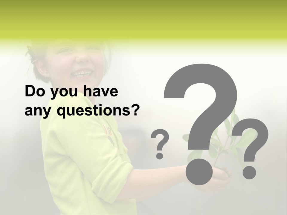 A Little Girl Holding A Plant With A Smile On Her Face PowerPoint Template