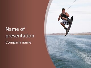 Young Man Catching Air On Wakeboard PowerPoint Template